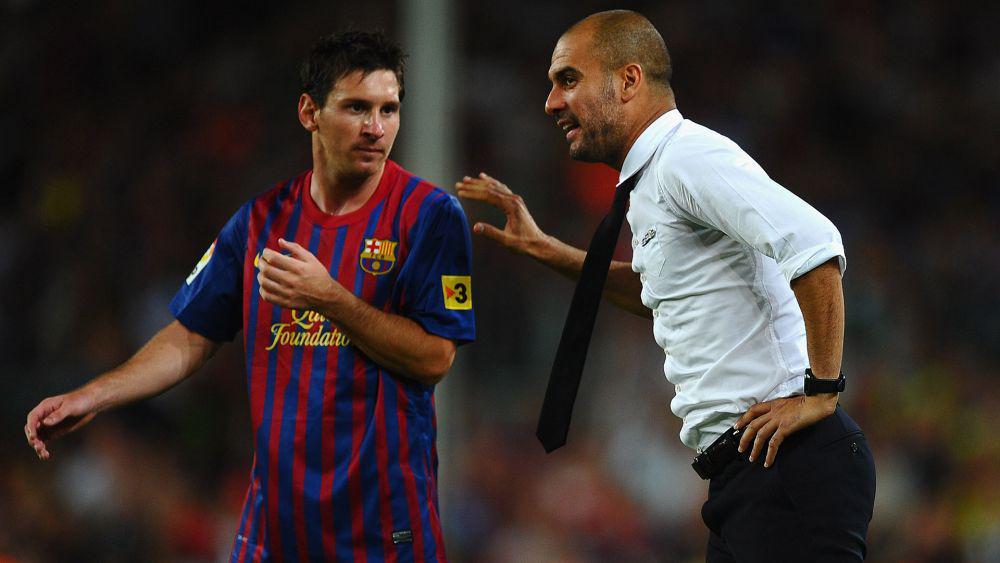 Lionel Messi dan Pep Guardiola (goal.com)