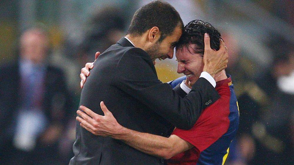 Pep Guardiola dan Lionel Messi (thetimes.co.uk)