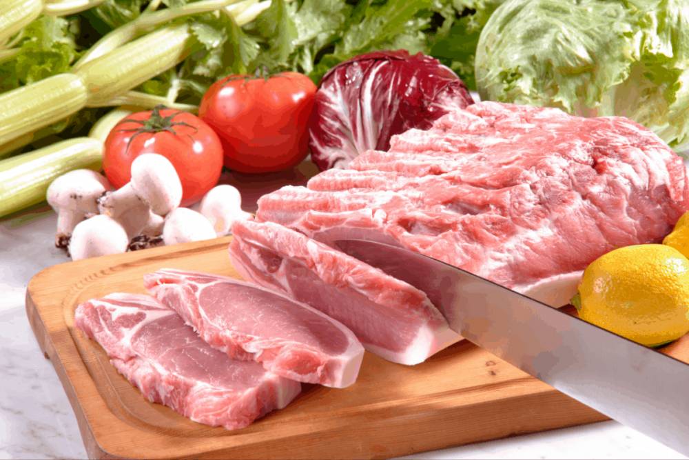 Memotong daging babi (yourmeatguide.com)