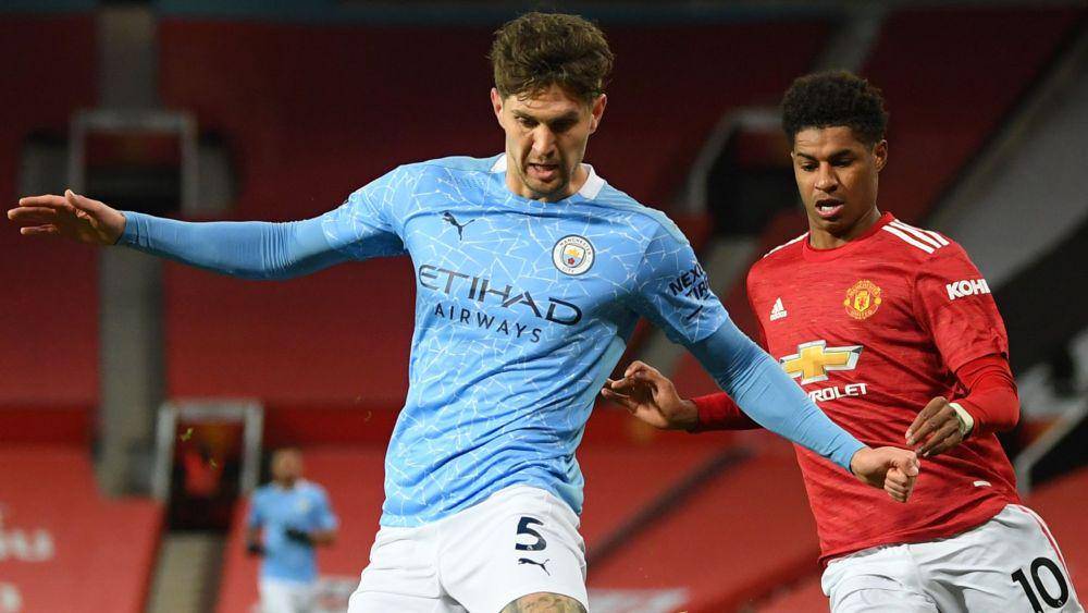 potret John Stones dan Marcus Rashford (skysports.com)