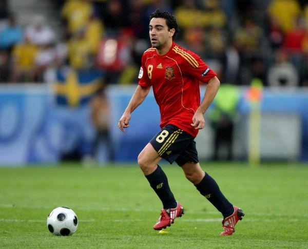 Xavi Hernandez saat tampil membela tim nasional Spanyol. (worldsoccertalk.com)