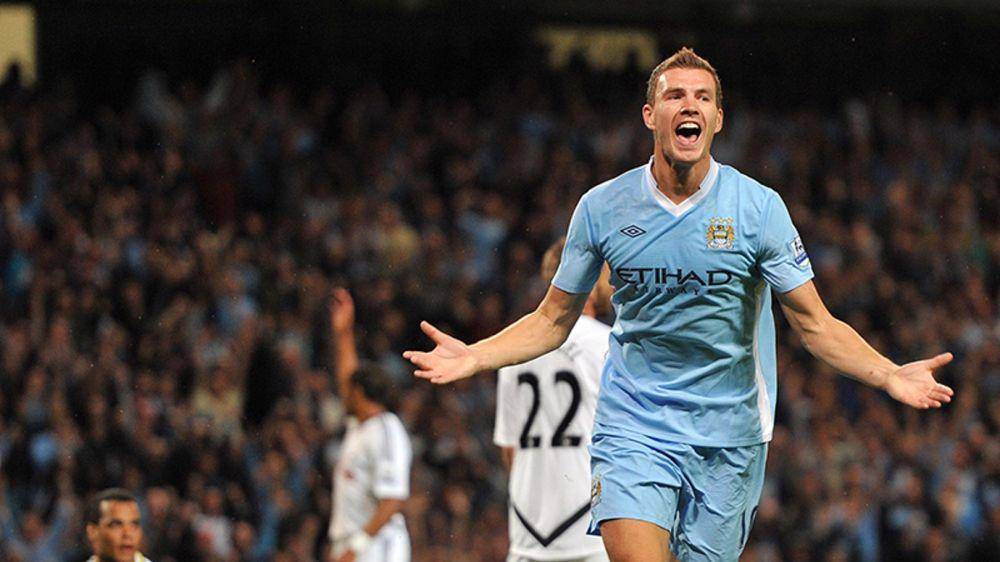 potret selebrasi gol Edin Dzeko (mancity.com)