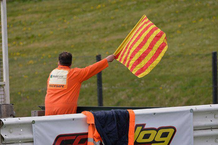 ilustrasi red and yellow stripes flag (thebikeinsurer.co.uk)