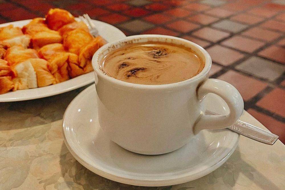 Secangkir kopi susu di Warung Kopi Purnama (instagram.com/nini.jecquiline)