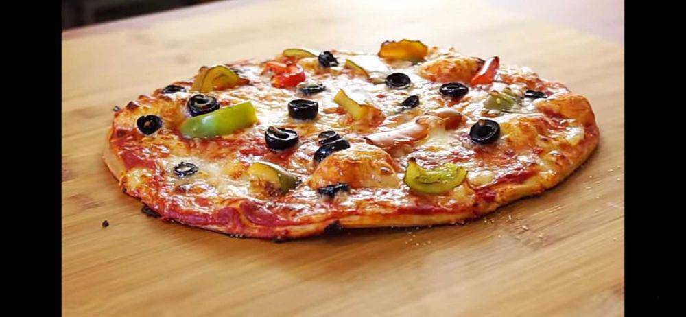 ilustrasi sajian pizza (youtube.com/Emma's Goodies)