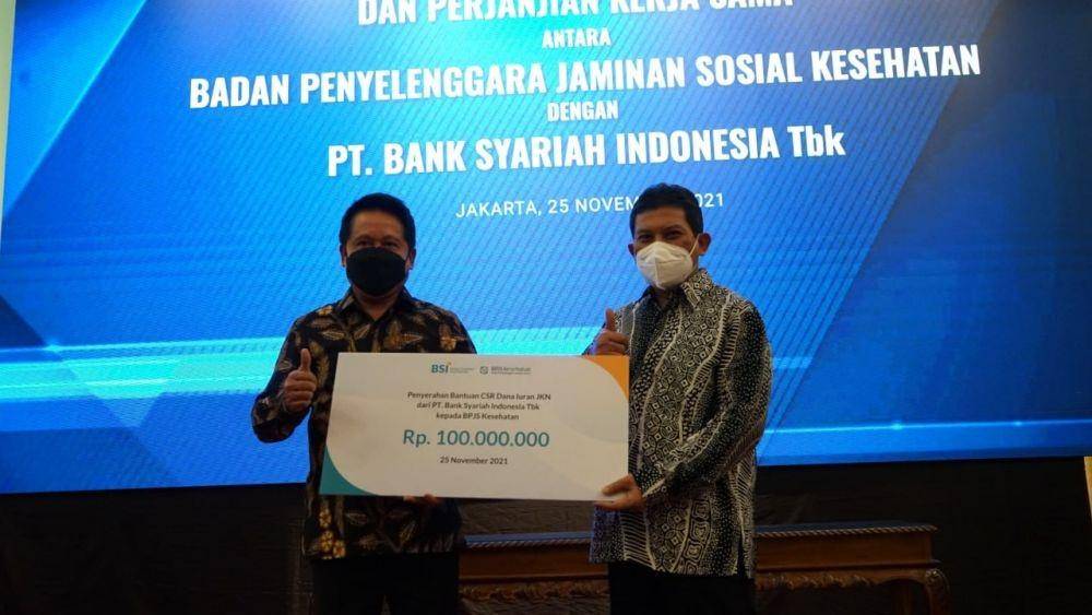 BPJS Kesehatan menggandeng mitra perbankan, yakni Bank Syariah Indonesia (BSI), dalam implentasi pembiayaan Supply Infrastructure Financting (SIF) melalui penandatanganan nota kesepahaman dan perjanjian kerja sama, Kamis (25/11/2021). (Dok. BPJS Kesehatan)