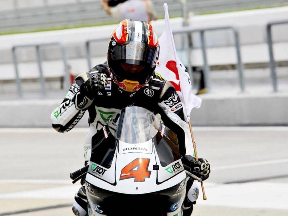 Hiroshi Aoyama membalap di kelas 250cc. (motogp.com)