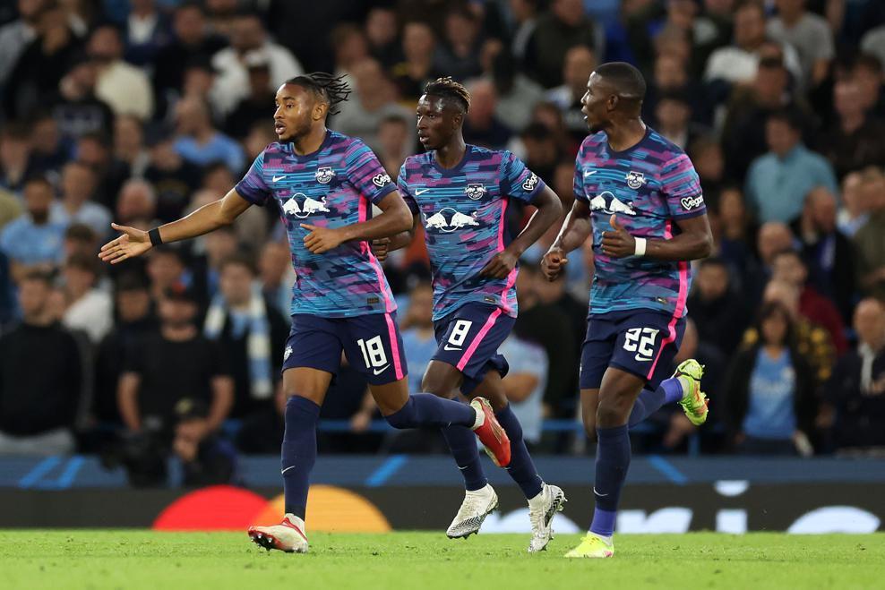 Cristopher Nkunku usai mencetak gol ke gawang Man City (uefa.com)
