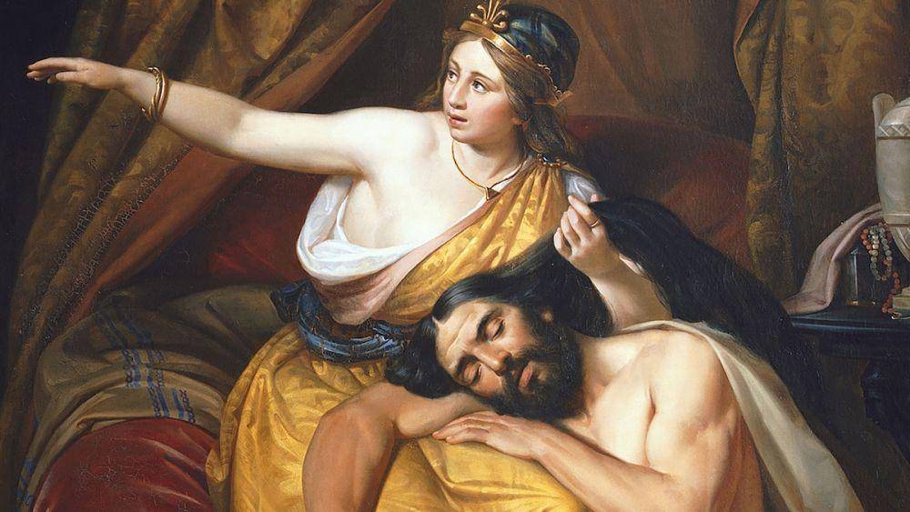 Ilustrasi Delilah memotong rambut Samson, dengan begitu kekuatan Samson hilang. (nationalgeographic.com)