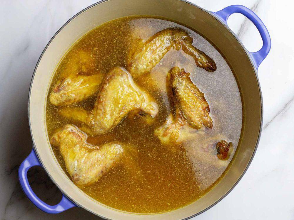 Memasak sup ayam jamur kuah jahe (seriouseats.com)