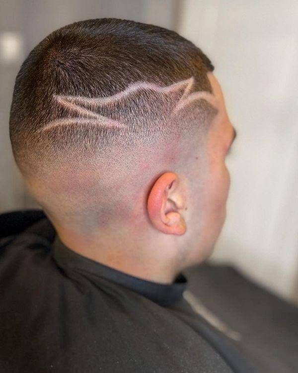 Ilustrasi model rambut tattoo buzz cut (instagram.com/lamake_barber)