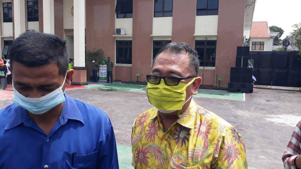 Kuasa hukum termohon, Rahmad Hardadi (masker kuning). IDN Times/Zainul Arifin