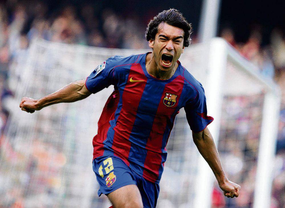 Giovanni van Bronckhorst ketika bermain dengan Barcelona. (football-espana.net)