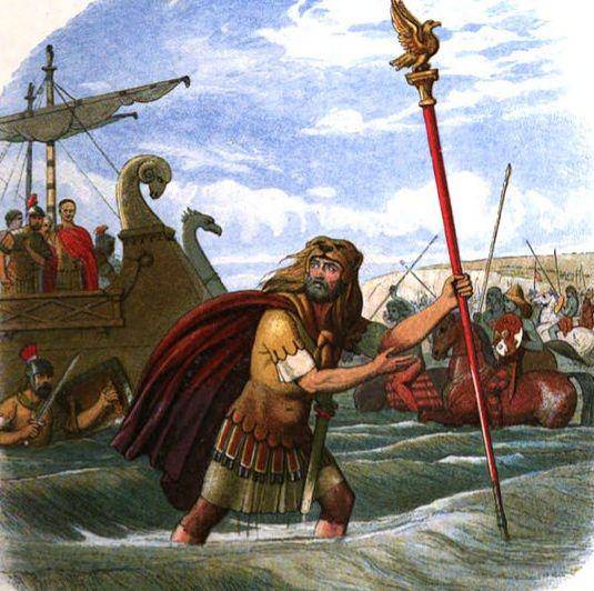 Ilustrasi Standard Bearer Legiun Kesepuluh melompat dari kapalnya dan berbaris ke pantai Inggris, memimpin invasi Romawi. (commons.m.wikimedia.org/The Britons)