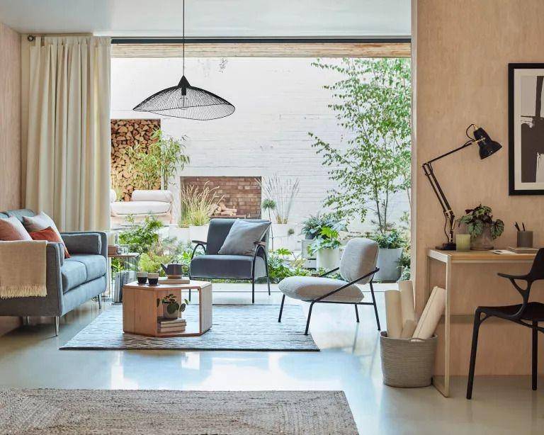 ilustrasi dekorasi ruang tamu dengan konsep open space (John Lewis via realhomes.com)
