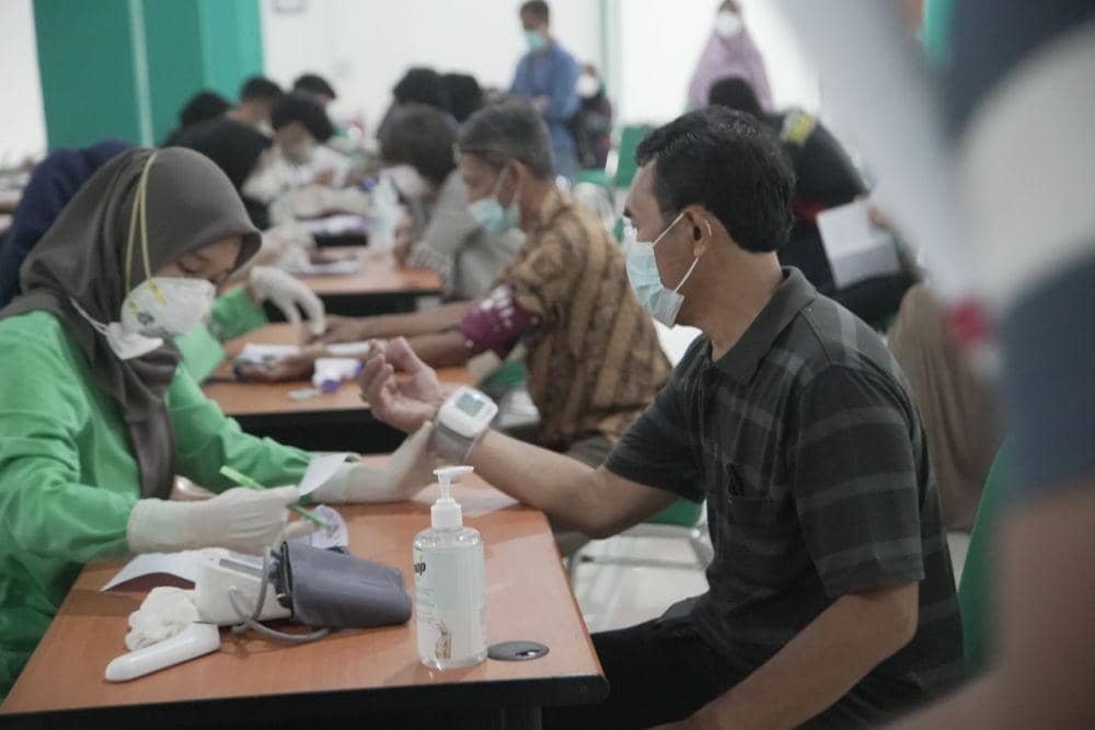 Universitas Lampung (Unila) membuka sentra vaksinasi booster (dosis ke-3) sebanyak 1.000 dosis, Minggu (20/2/2022). (Dok. Unila).