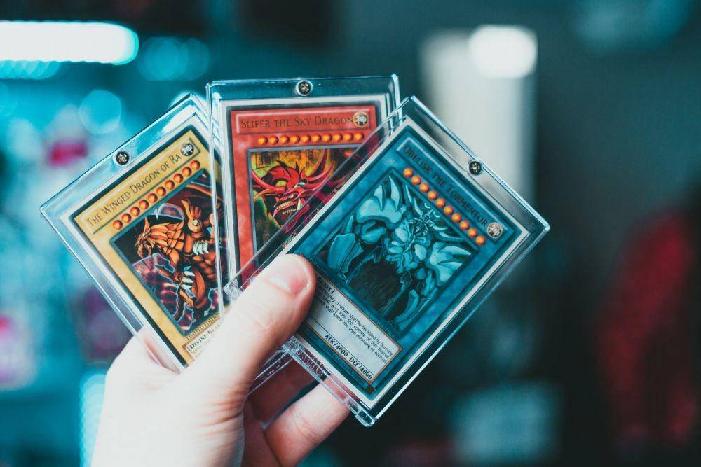 ilustrasi tiga kartu dewa Yu-Gi-Oh! (unsplash.com/Erik Mclean)