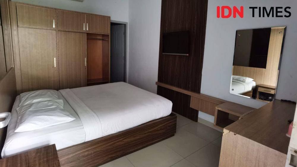 Ilustrasi kamar hotel. IDNTimes/Larasati Rey