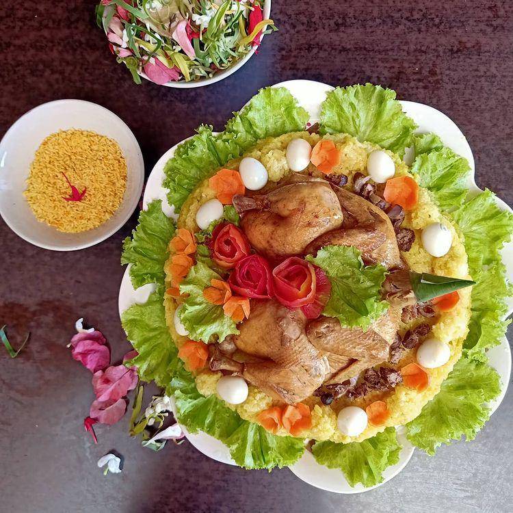 ketan kunyit panggang ayam (instagram.com/tumpengcikpuanpalembang)