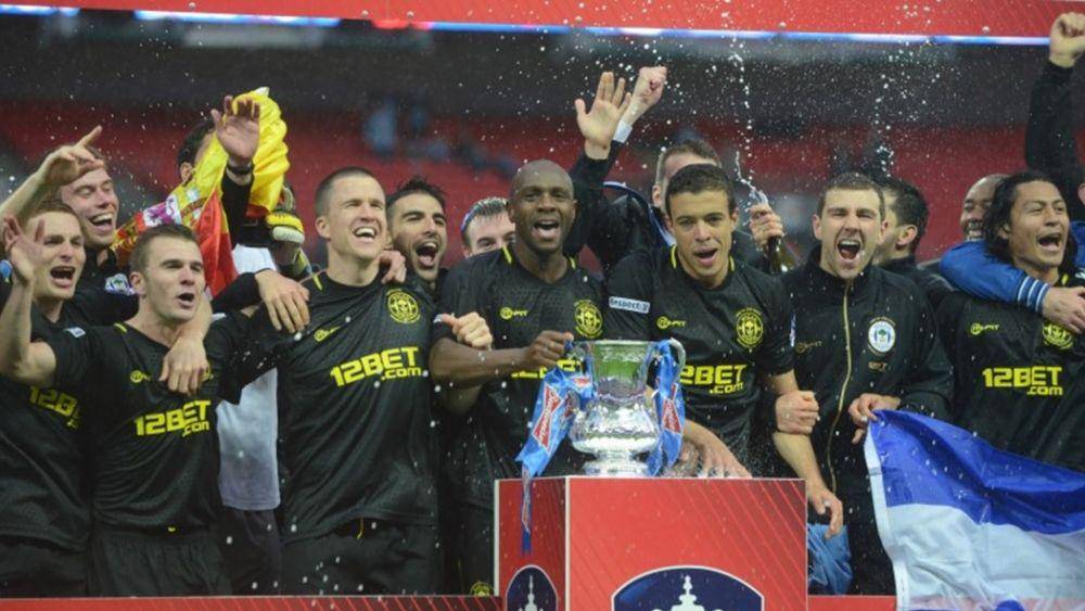 para pemain Wigan Athletic berselebrasi kemenangan FA Cup 2013 (thefacup.com)