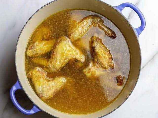 ilustrasi ayam kuah kuning (seriouseats.com)
