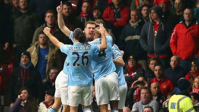 potret pemain Manchester City melakukan selebrasi di Derbi Manchester pada 2014 (skysports.com)