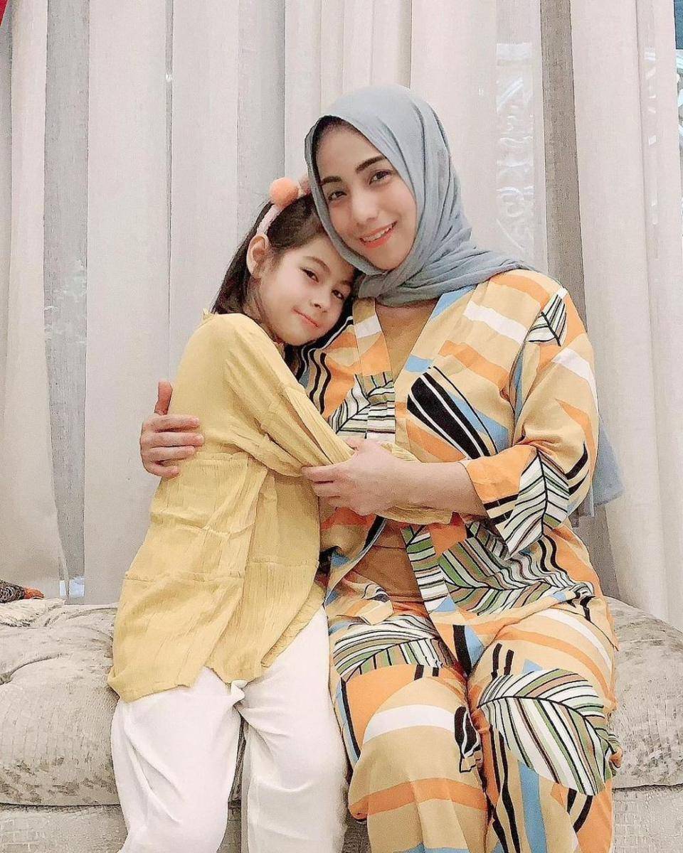 Siti KDI dan anak (instagram.com/siti_perk)
