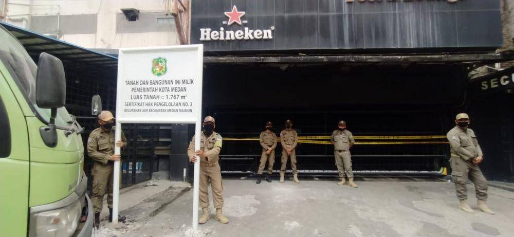 Suasana penertiban dan Ambilalih Aset Daerah Eks Gedung Parkir Perisai Plaza oleh Pemko Medan (Dok. Istimewa)