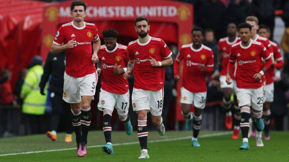 pemain Manchester United memasuki lapangan (premierleague.com)