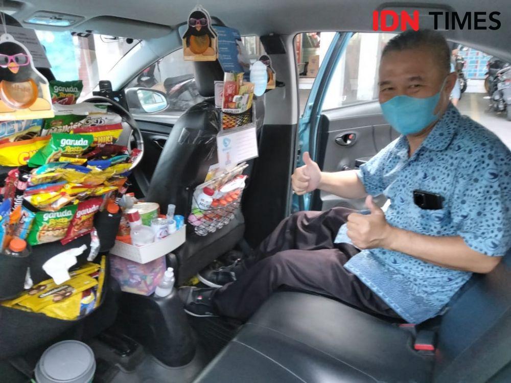 Gudianto, Sopir Taksi Viral yang Memenuhi Mobilnya dengan Snack