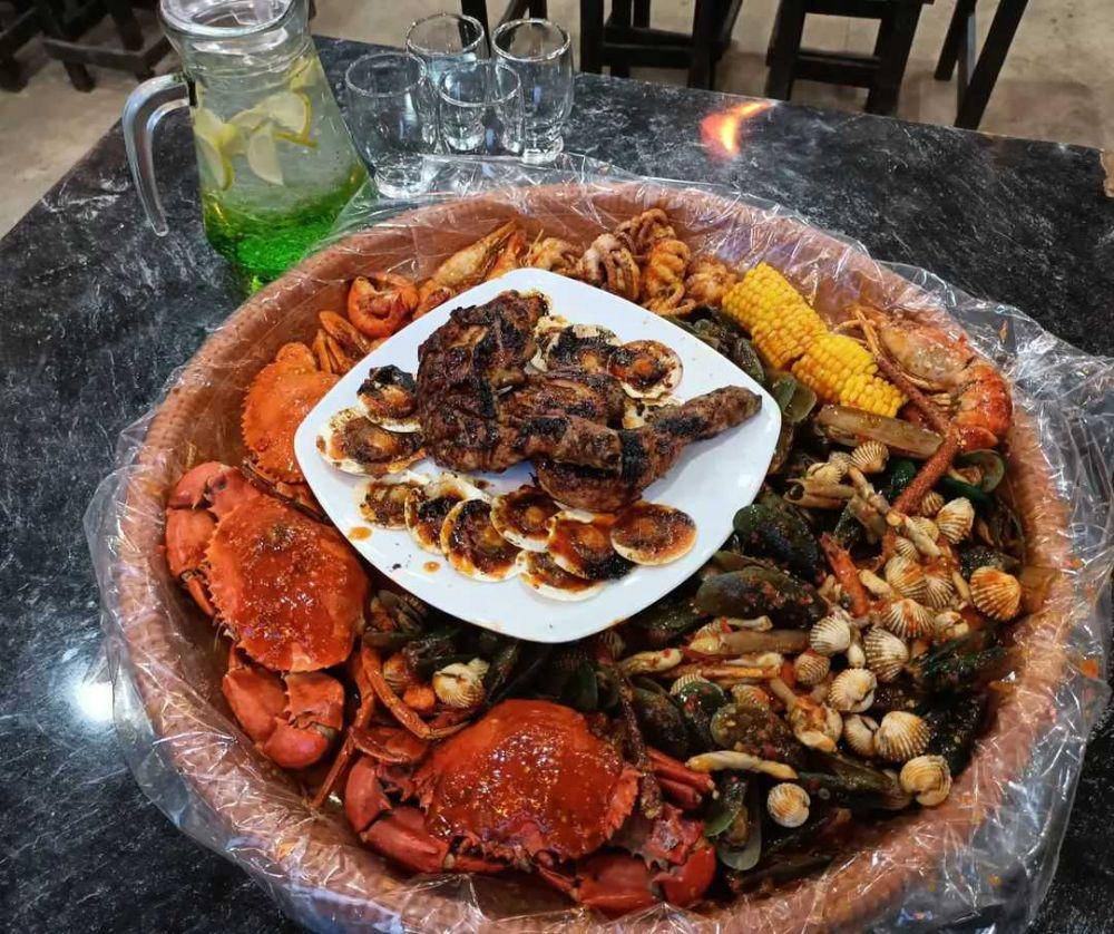 menu kepiting tampah di Rumah Seafood Palembang (instagram.com/rumahseafoodpalembang)