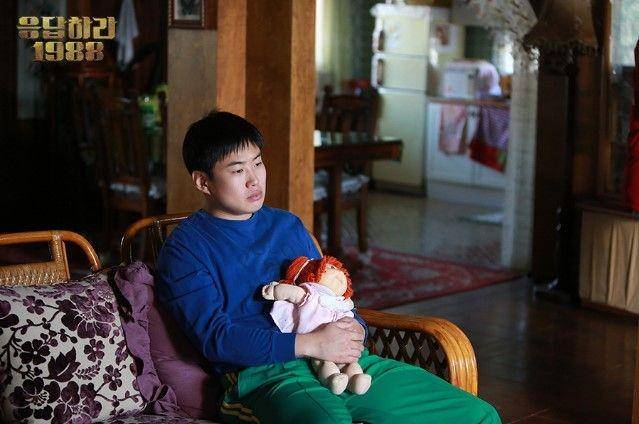 Ahn Jae Hong sebagai Jung Bong (dok. tvN/Reply 1988)