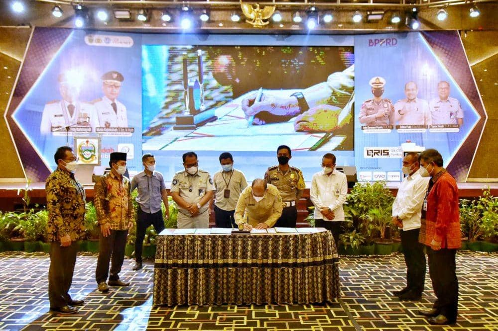 Gubernur Sumatera Utara (Sumut) Edy Rahmayadi menghadiri sekaligus meresmikan peluncuran pembayaran pajak kendaraan bermotor menggunakan QRIS (Dok. Dinas Kominfo Provinsi Sumut/ Veri Ardian)