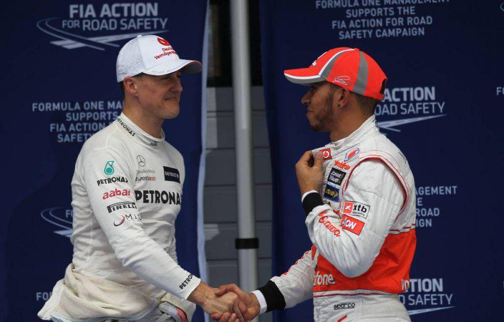 Michael Schumacher dan Lewis Hamilton (planetf1.com)