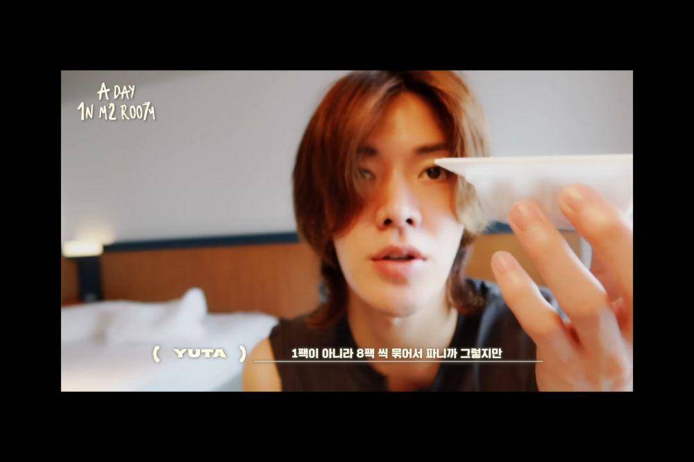Yuta NCT 127 sedang memakan Natto. (youtube.com/NCT 127)