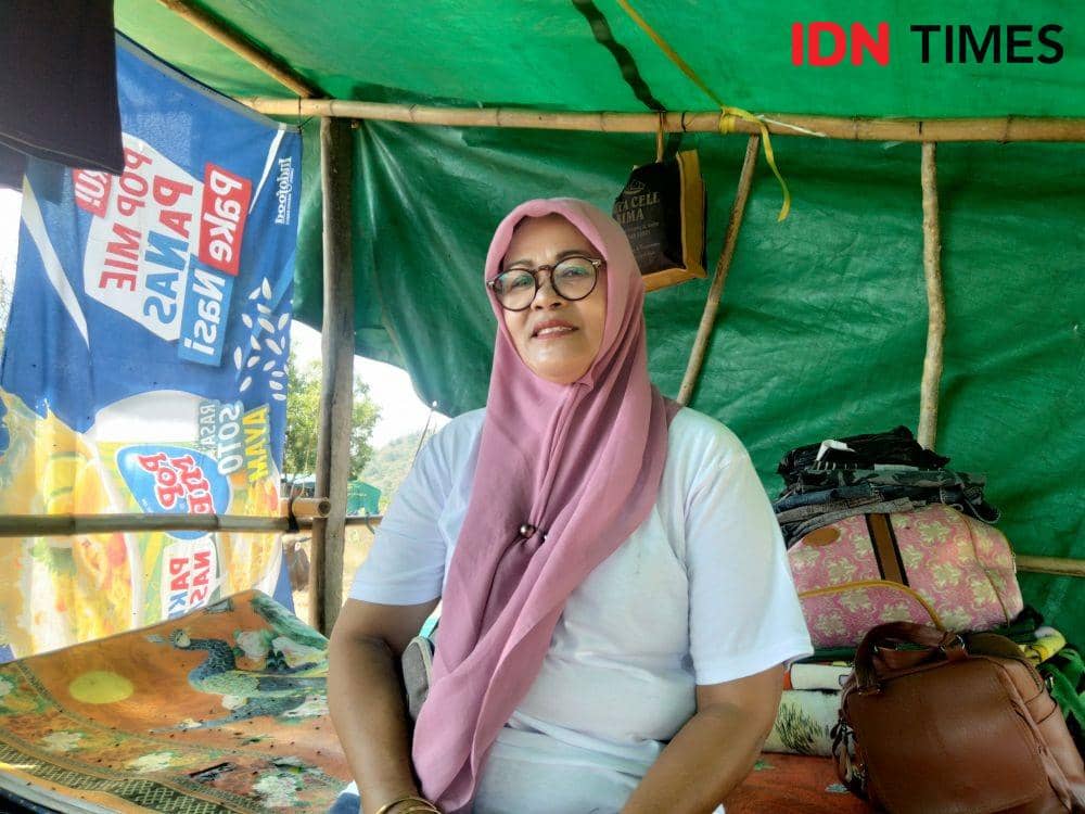 Foto pedagang sapi, Rohani warga Pena To'i. (IDN Times/Juliadin)