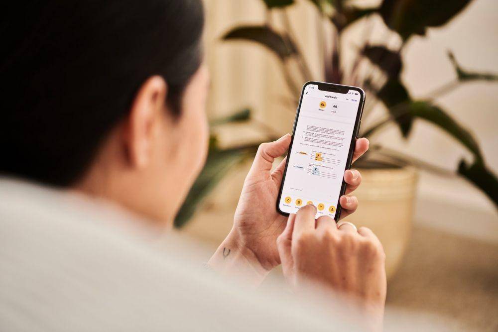 ilustrasi ukuran teks pada iPhone (unsplash.com/DocuSign)