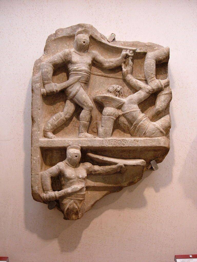 ilustrasi pahatan gladiator kelas secutor menang atas retiarius (wikimedia.org)