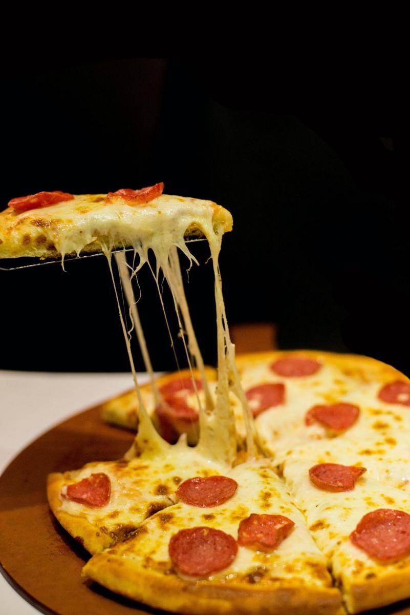ilustrasi pizza (unsplash.com/Fatima Akram)