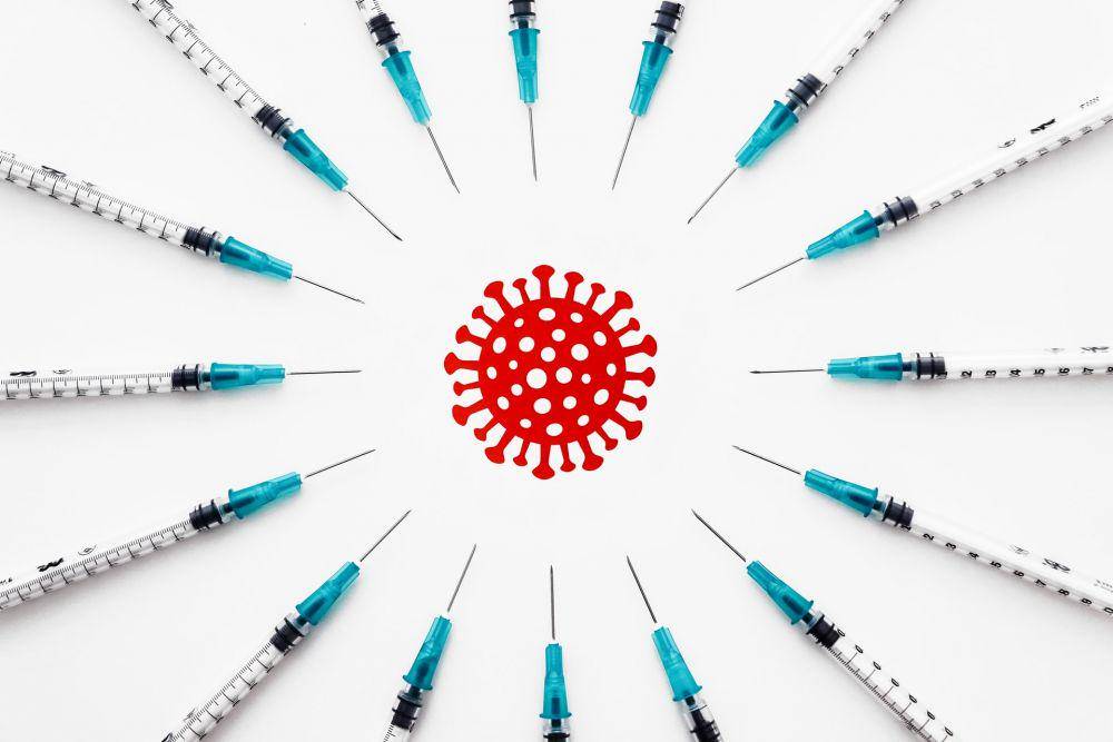 ilustrasi vaksin (unsplash.com/Jeremy Bezanger)