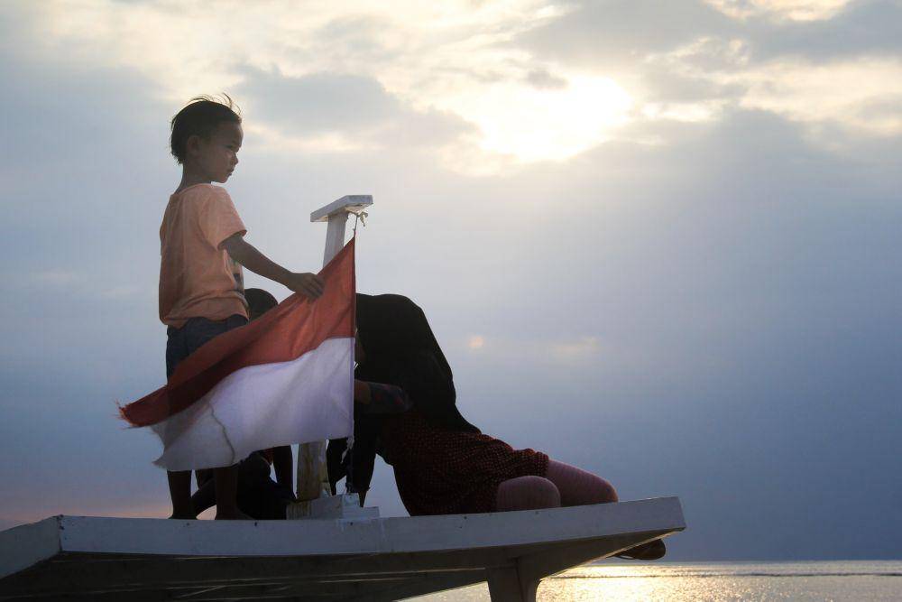 Ilustrasi bendera Indonesia (unsplash.com/Thiago Rocha)