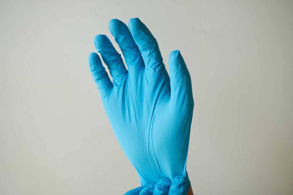 ilustarsi sarung tangan latex (unsplash.com/@uniqueton)