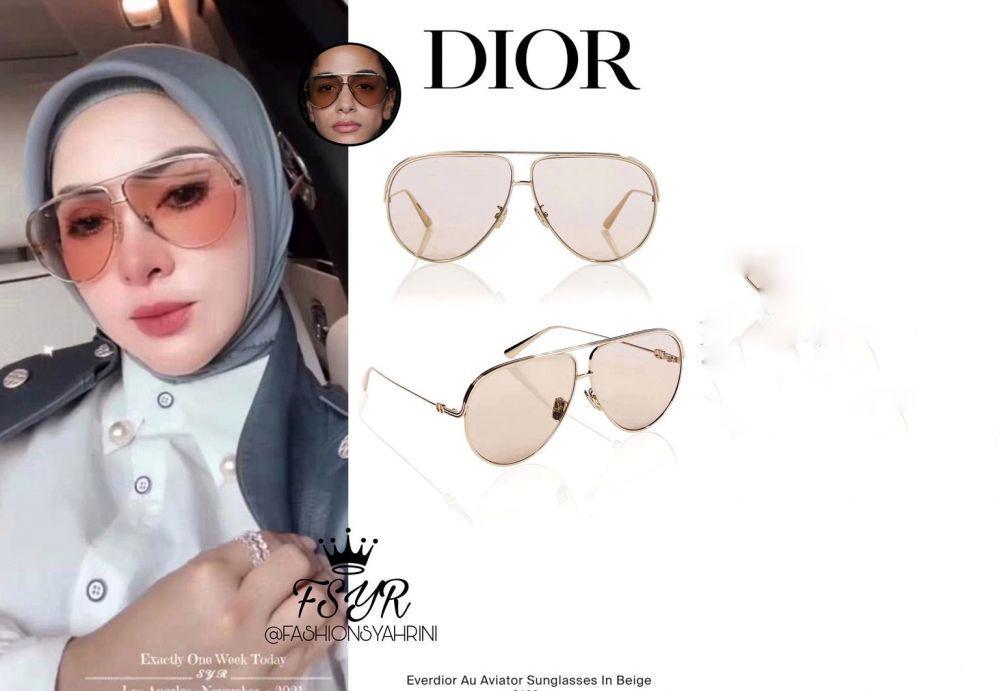 Syahrini memakai kacamata dari merk Dior (instagram.com/fashionsyahrini2)