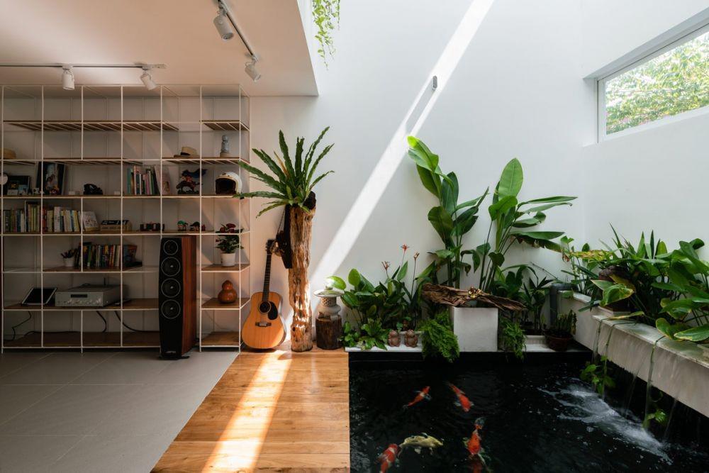 9 Desain Rumah dengan Kolam Ikan, Hawanya Langsung Segar