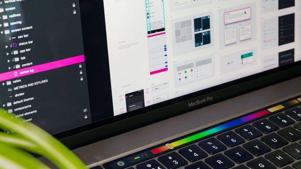 ilustrasi Touch Bar MacBook (unsplash.com/Tirza van Dijk)