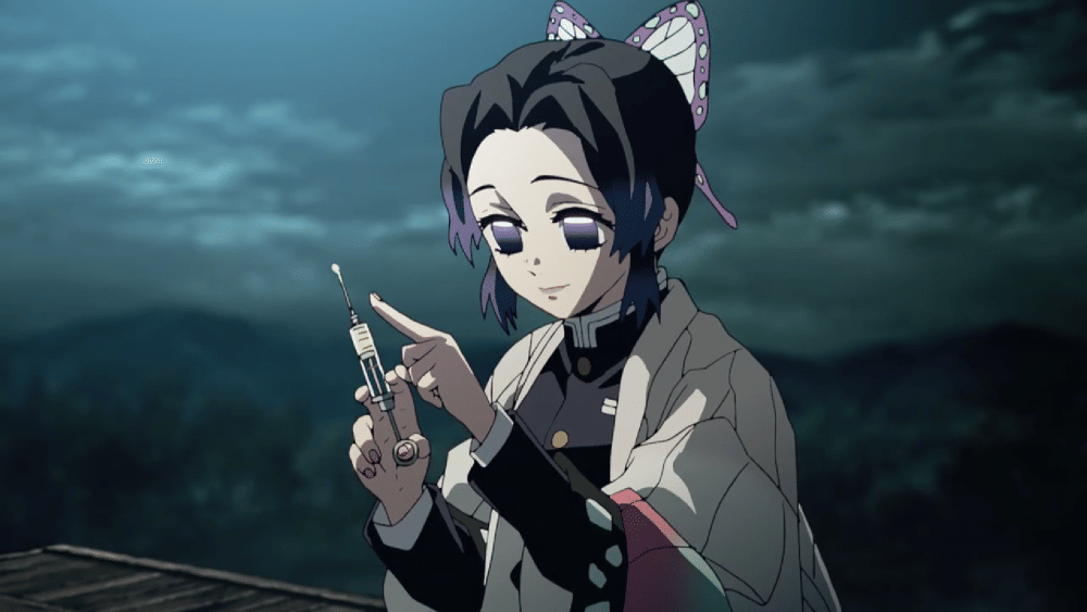 Shinobu menyuntikkan obat untuk Zenitsu (dok. Ufotable/ Kimetsu no Yaiba)