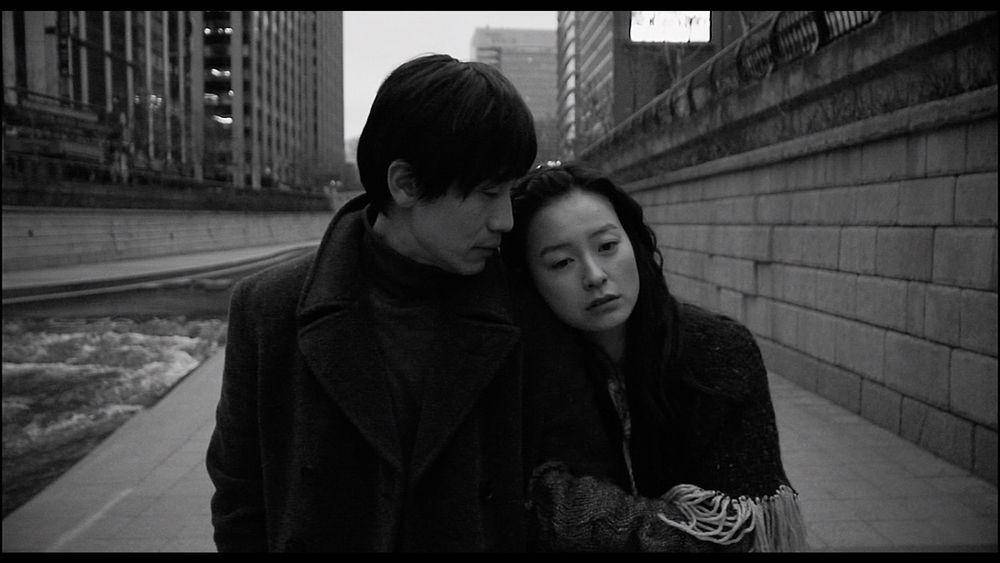 Shin Ha Kyun dan Jung Yu Mi di Cafe Noir (dok. Polaris/Cafe Noir)