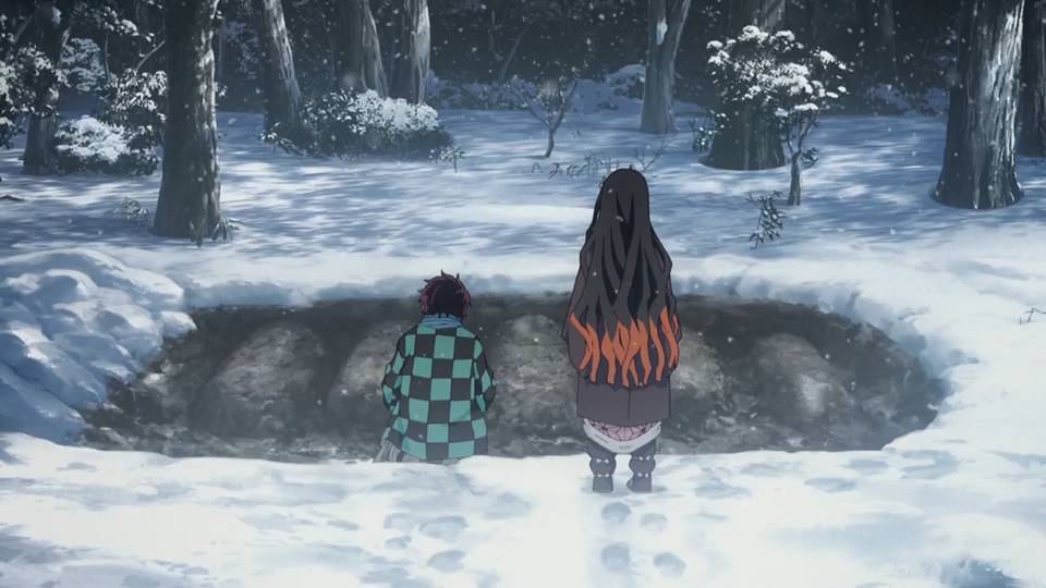 Tanjiro mengubur keluarganya. (dok. Ufotable/Demon Slayer: Kimetsu no Yaiba)
