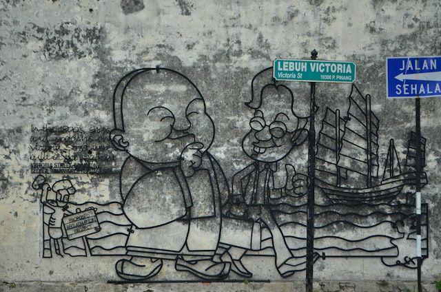 Salah satu street art di Penang yang dibuat dari kawat (unsplash.com/ Anelale Nájera )