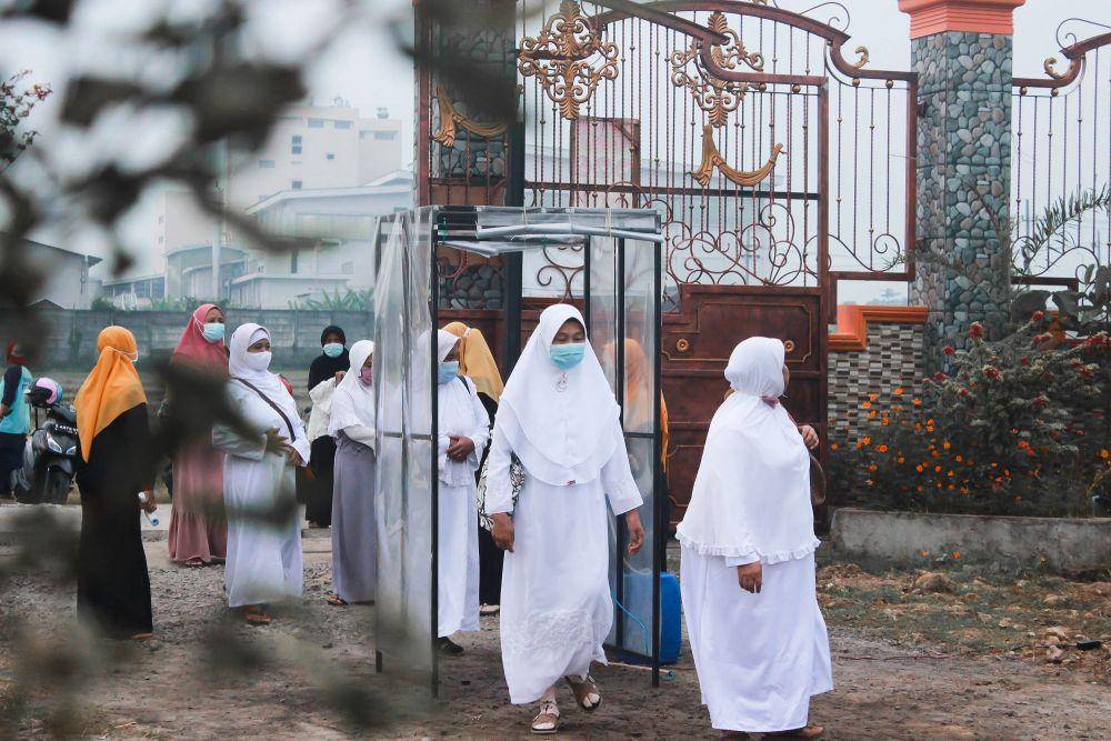 ilustrasi jamaah umrah (unsplash.com/Windi Setyawan)